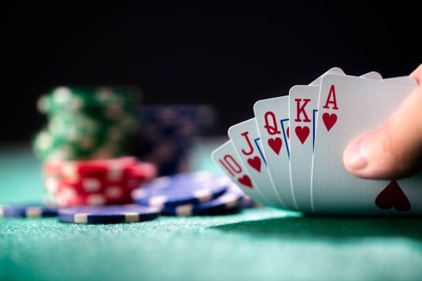 Three Card Poker live studio with dealer and cards Three Card Poker live studio with dealer and cards